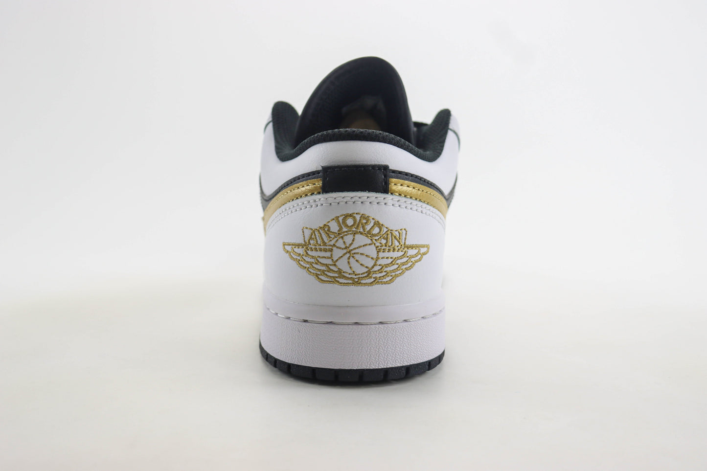 Air Jordan 1 Low Gold Swoosh