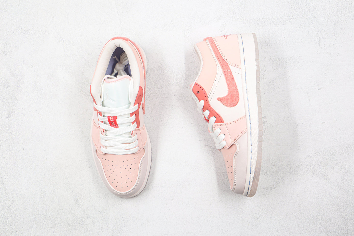 Air Jordan 1 Low Mighty Swooshers Pink