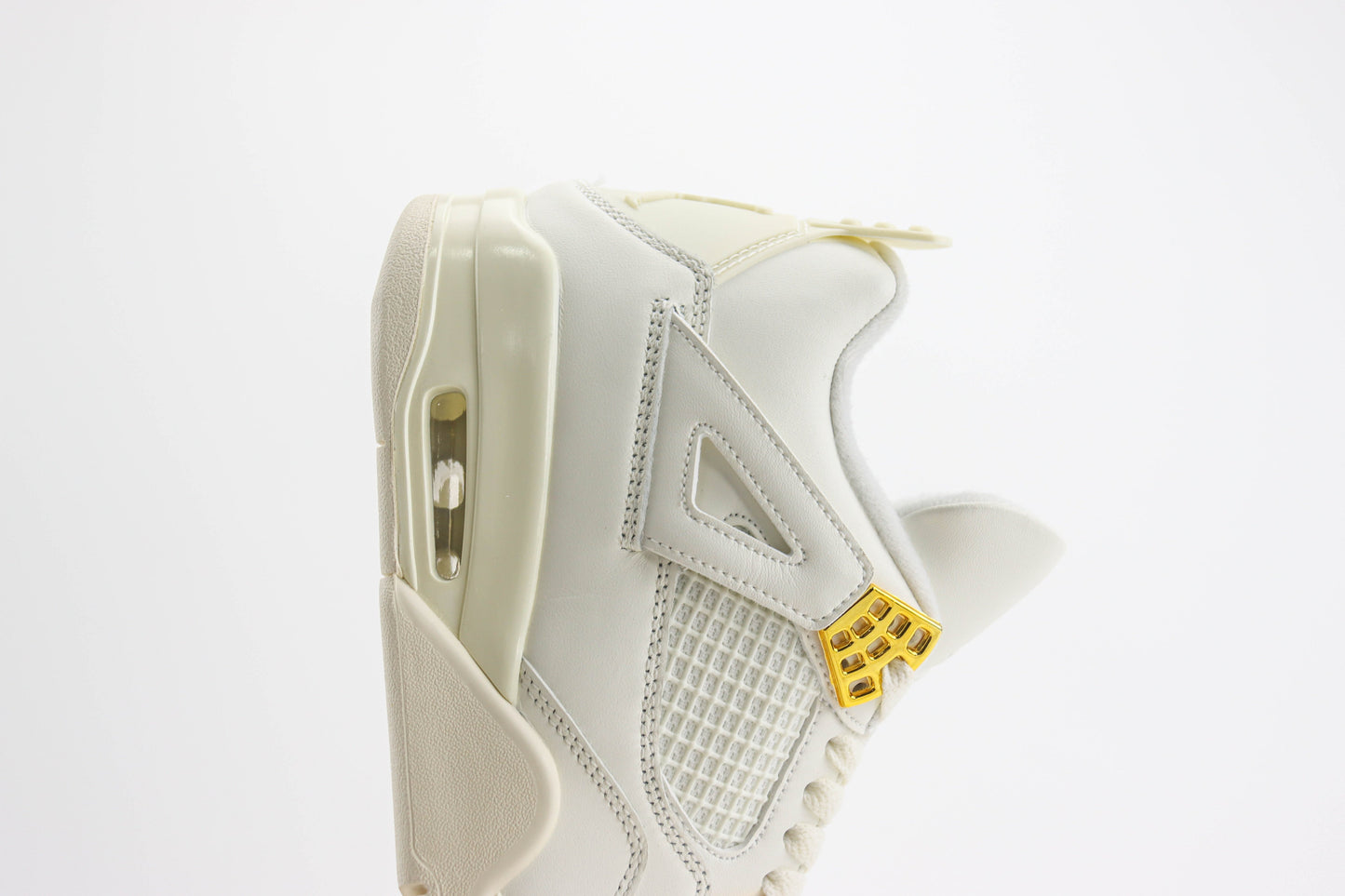 Air Jordan 4 Metallic Gold